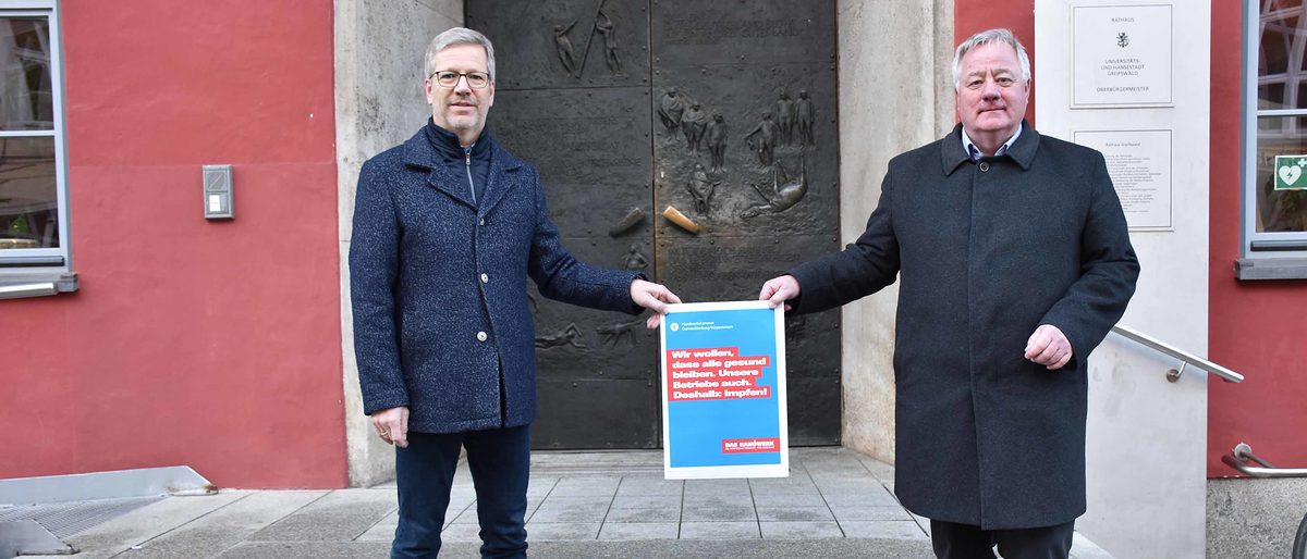 Oberbürgermeister Dr. Stefan Fassbinder und Präsident Axel Hochschild